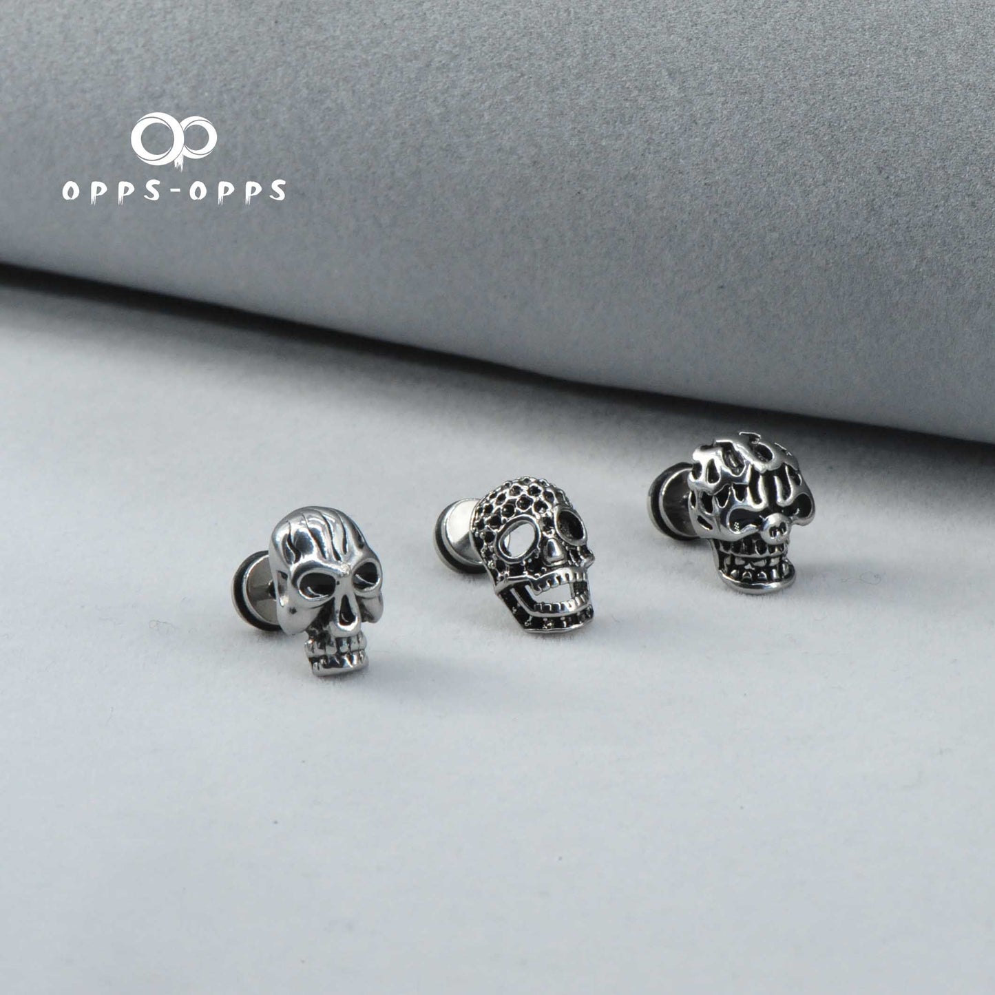 SKULL CARVING STUD EARRING